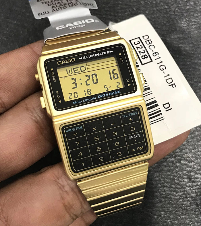 Reloj Casio Unisex DBC-611G-1 Iluminador dorado Telememo Calculadora